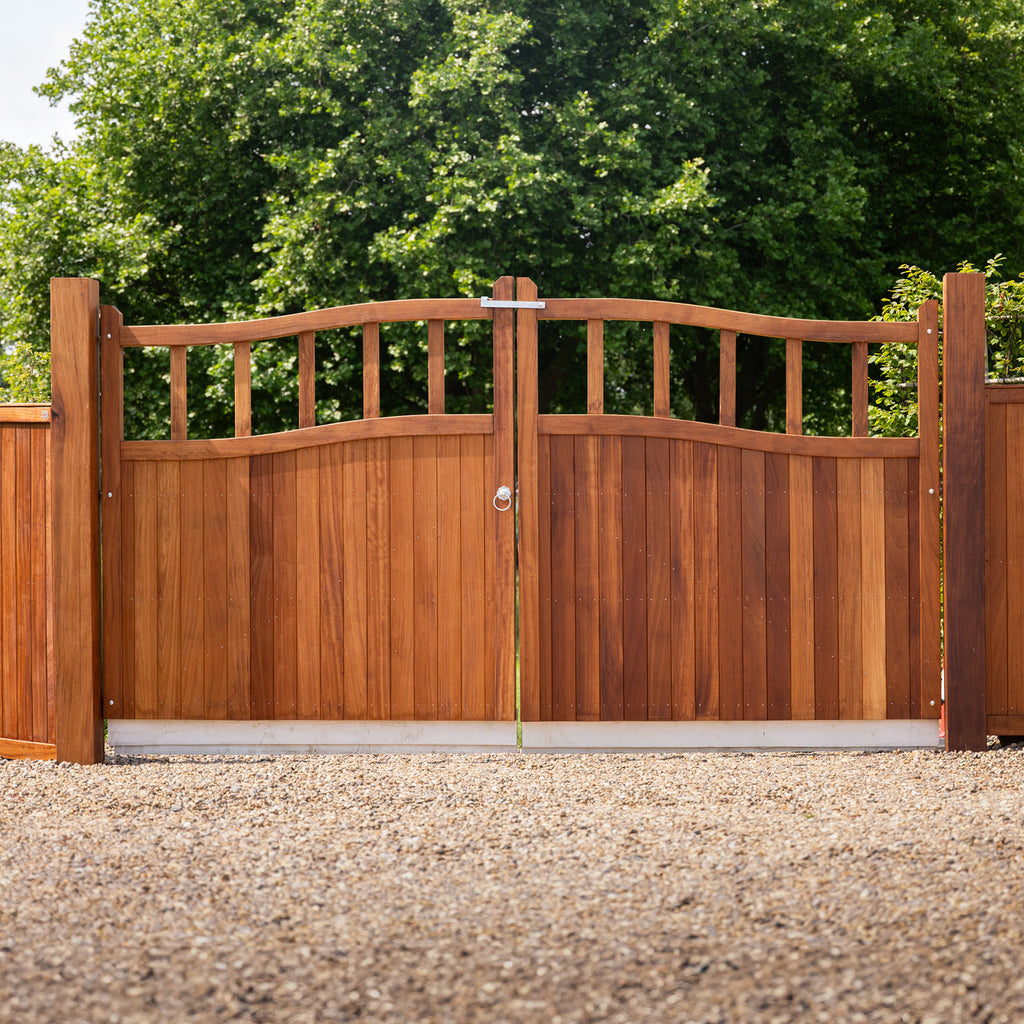 Lifestyle shot of Iroko Swan Neck gates installed in garden