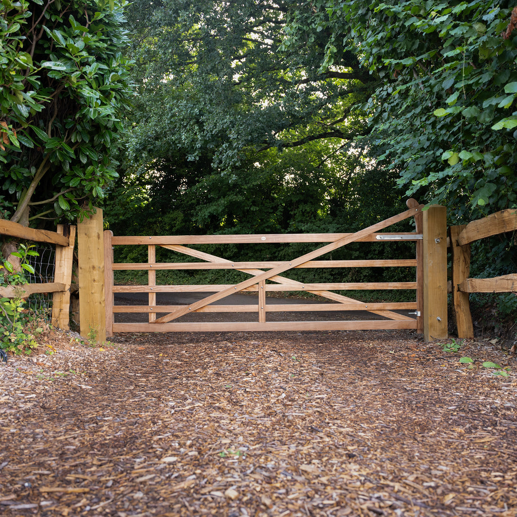 Lifestyle image showing Iroko Exbourne gate from the front, installed at a property entrance