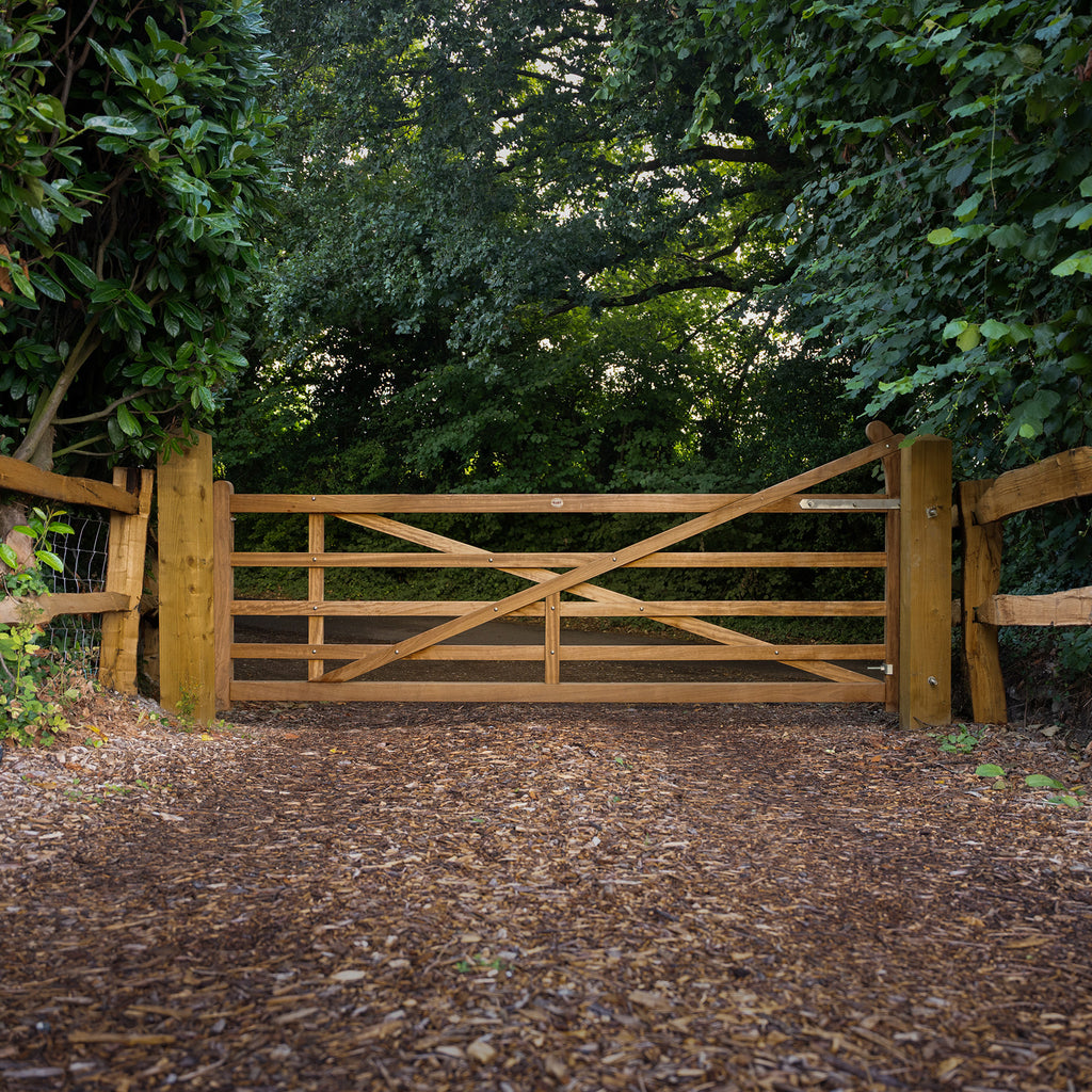 Lifestyle image showing Iroko Exbourne gate from the front, installed at a property entrance