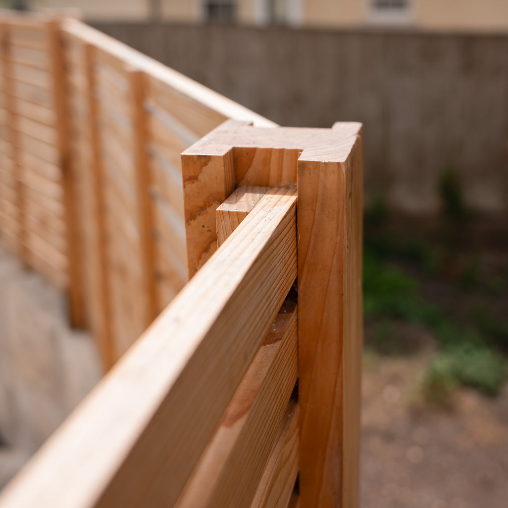 Lifestyle picture of Cedar Rebated Fence Posts