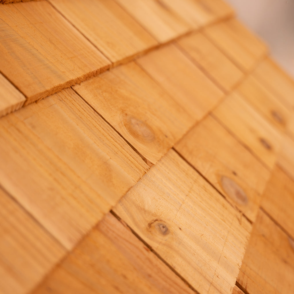 Cedar shingles, shown in formation from a side angle