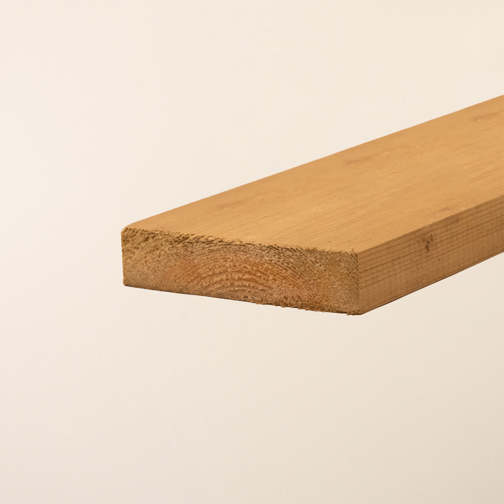 4-inch x 1-inch (100mm x 22mm) Pressure Treated Timber with rough sawn finish, showing the green tanalith treatment that provides long-lasting protection against rot and fungal decay
