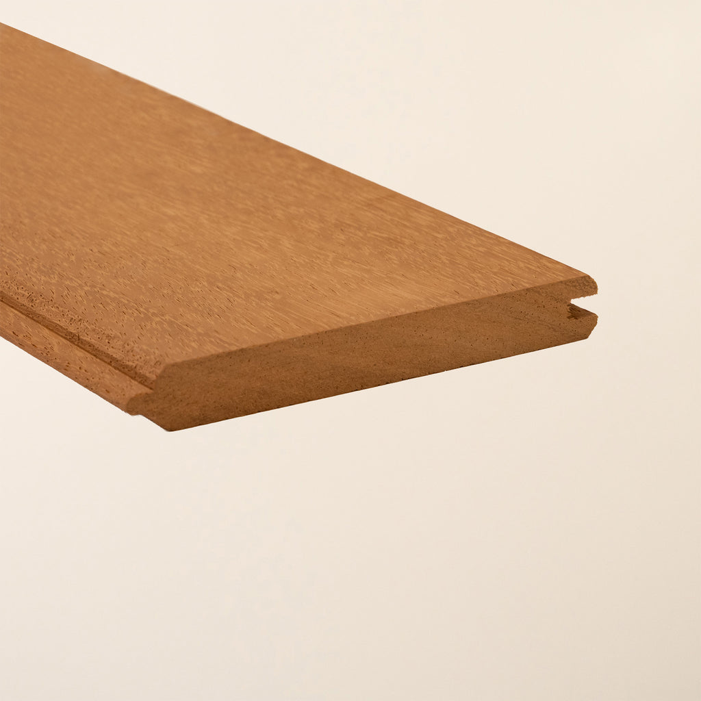 Iroko T&G cladding boards with golden-brown finish