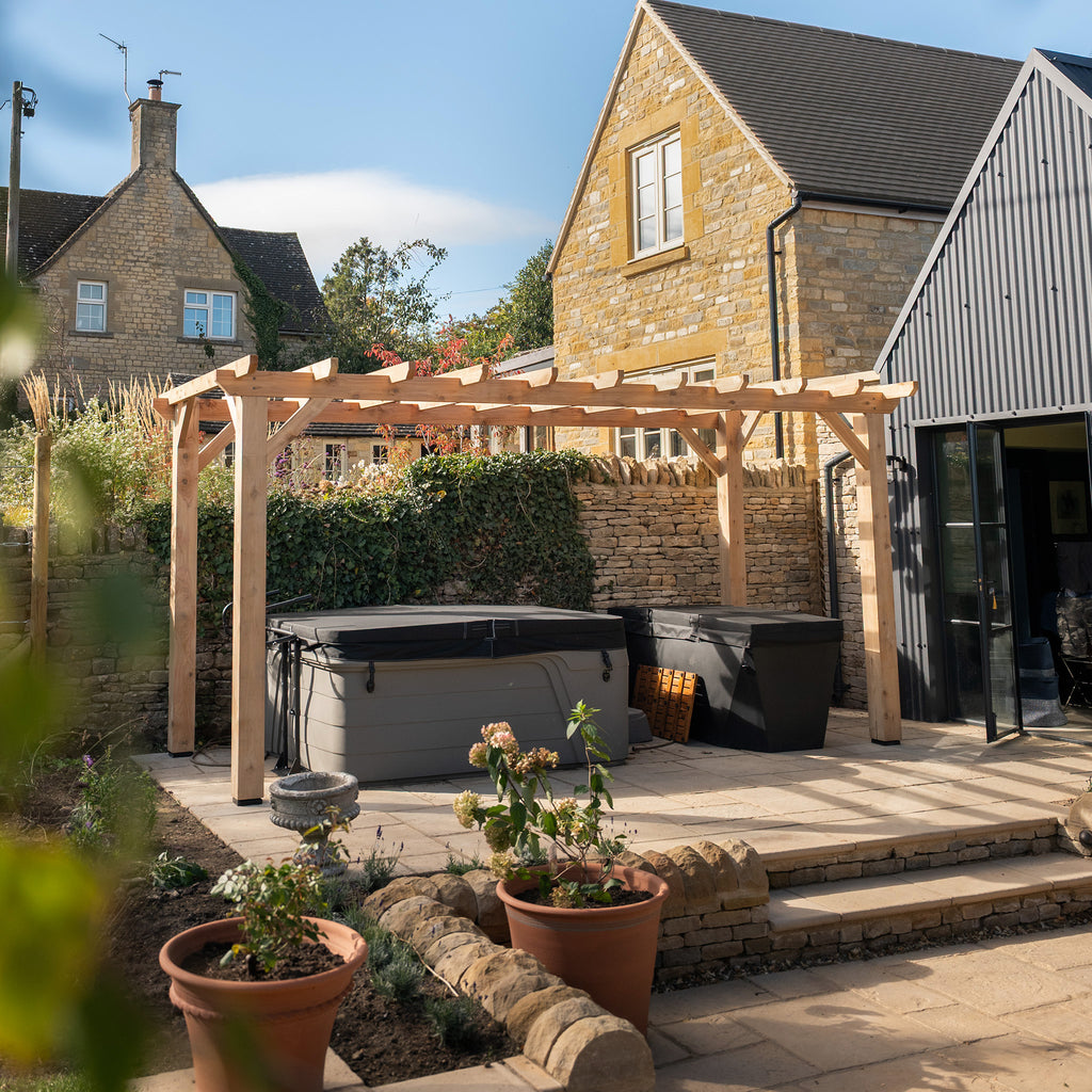 Lifestyle image of flat and open roof pergola