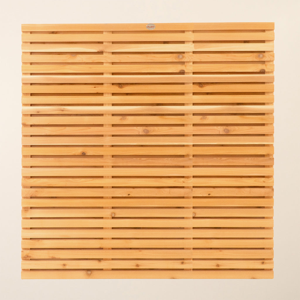 Front view of Double Sided Planed Cedar/Larch Slatted Panel displaying horizontal slat design and natural wood finish