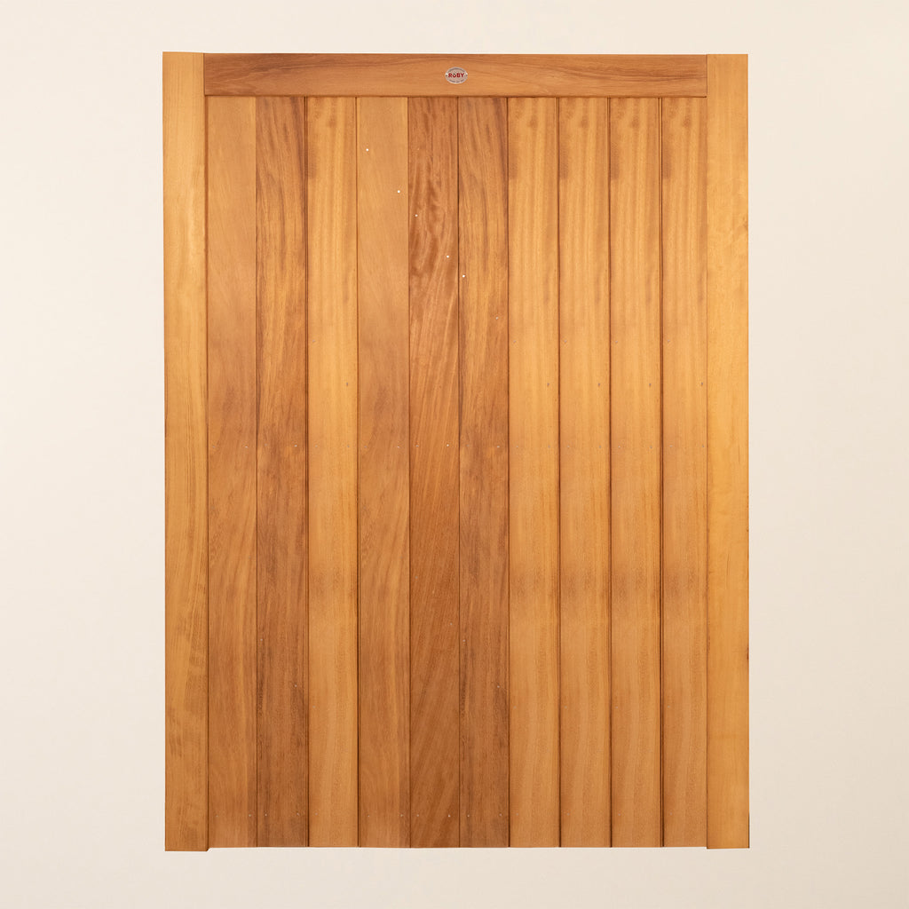 Front view of Iroko Croyde Mortise & Tenon Single Entrance Gate showcasing the elegant vertical design, premium hardwood finish, and traditional craftsmanship. The gate's proportions and sturdy construction highlight its quality and durability.