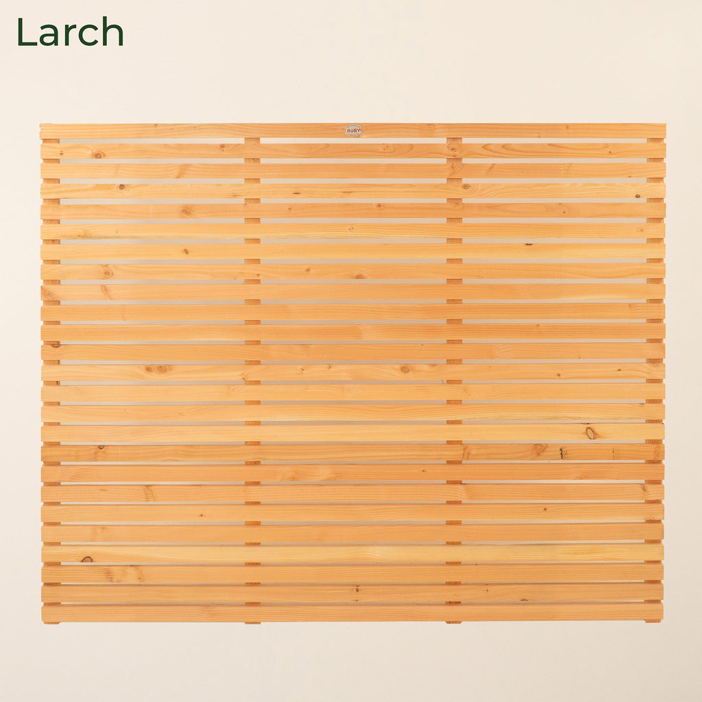 Larch version of Full-Height Slatted Wall with Pergola Kit displaying the natural wood grain and planed finish that complements outdoor living spaces