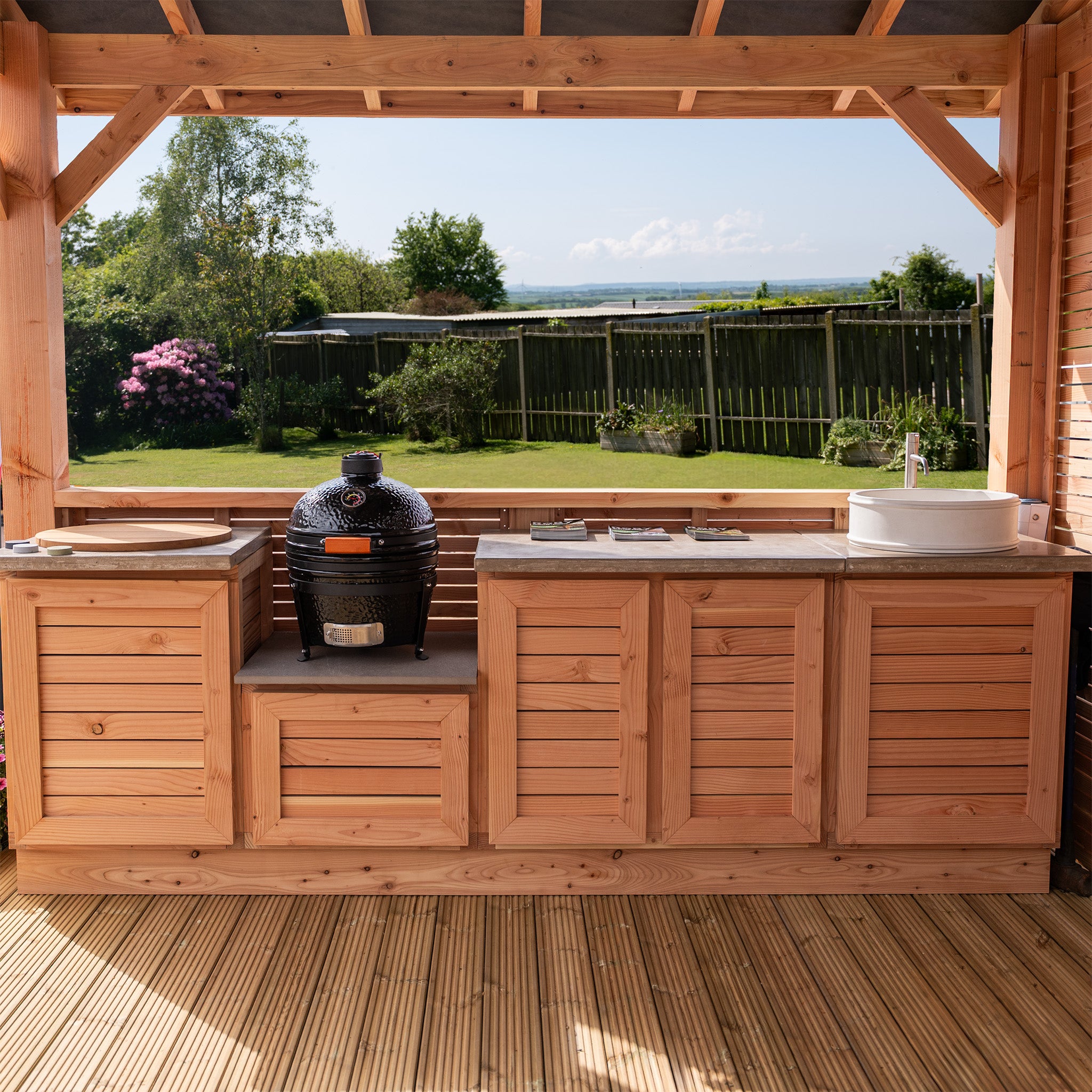 Outdoor Kitchen with Slatted Cabinets Polished Concrete Worktop