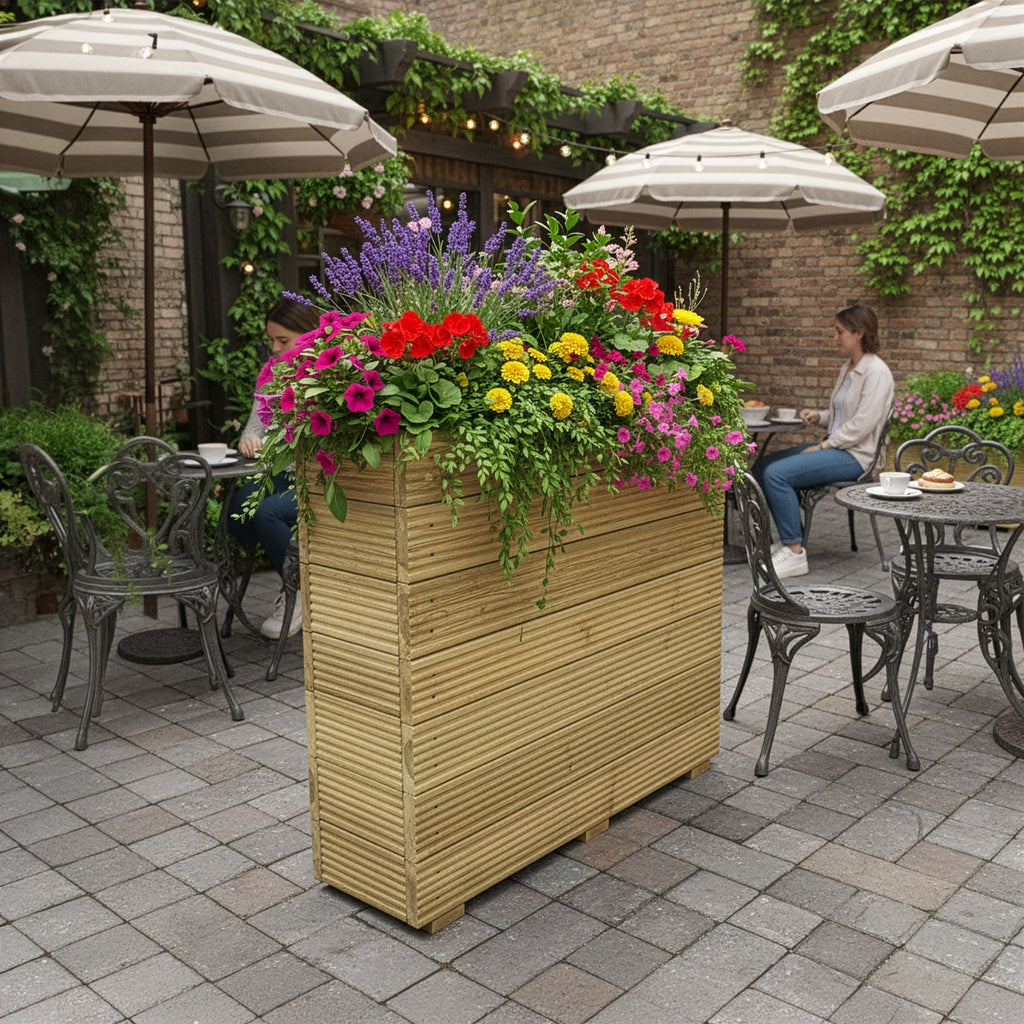Lifestyle image of a restaurant planter installed in a cafe garden