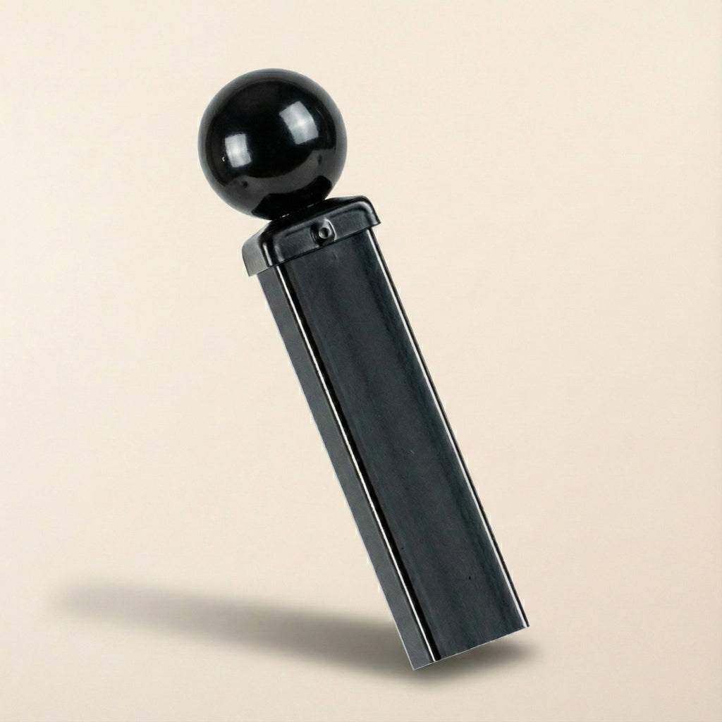 Black metal fence post with decorative ball top and square bolt-down base plate