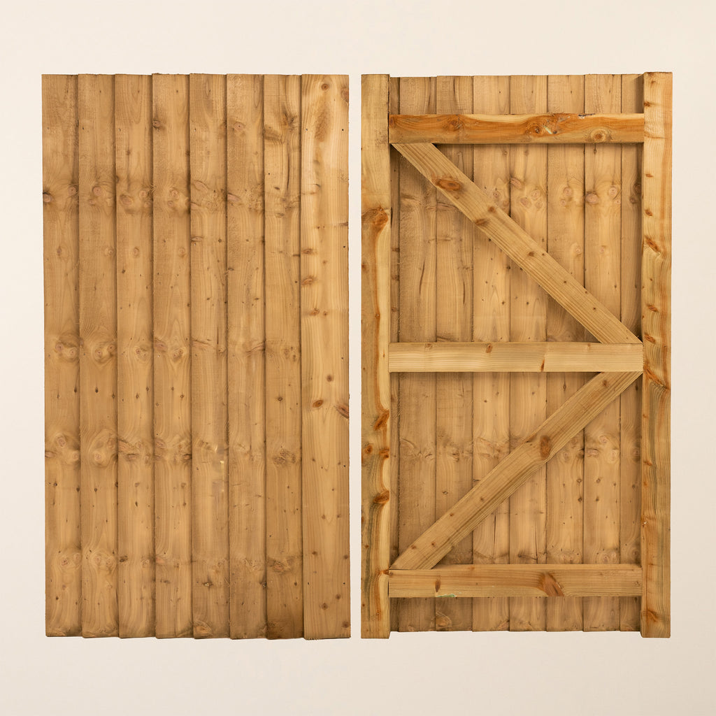 Shebbear Featheredge Entrance Gates shown as a complete pair, featuring vertical featheredge boards creating a solid, private barrier