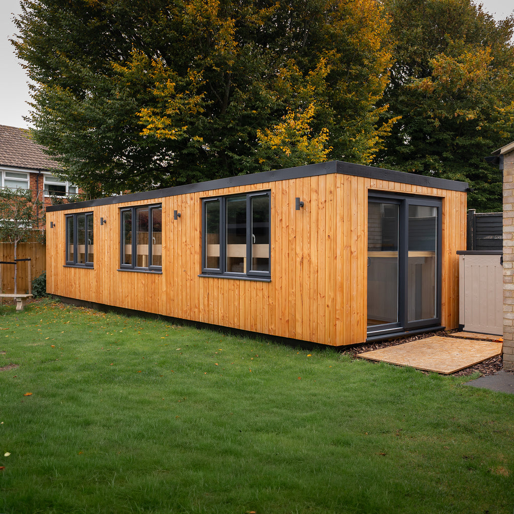 Lifestyle shot of Larch shadow gap, shown installed on garden building
