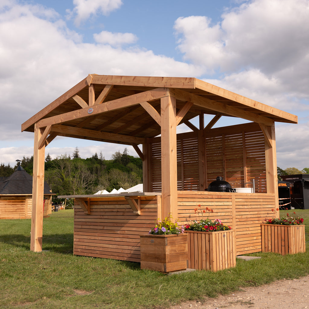 Planed Larch Pergola - Apex - With Overhang - Cedar Featheredge Roof Main shot