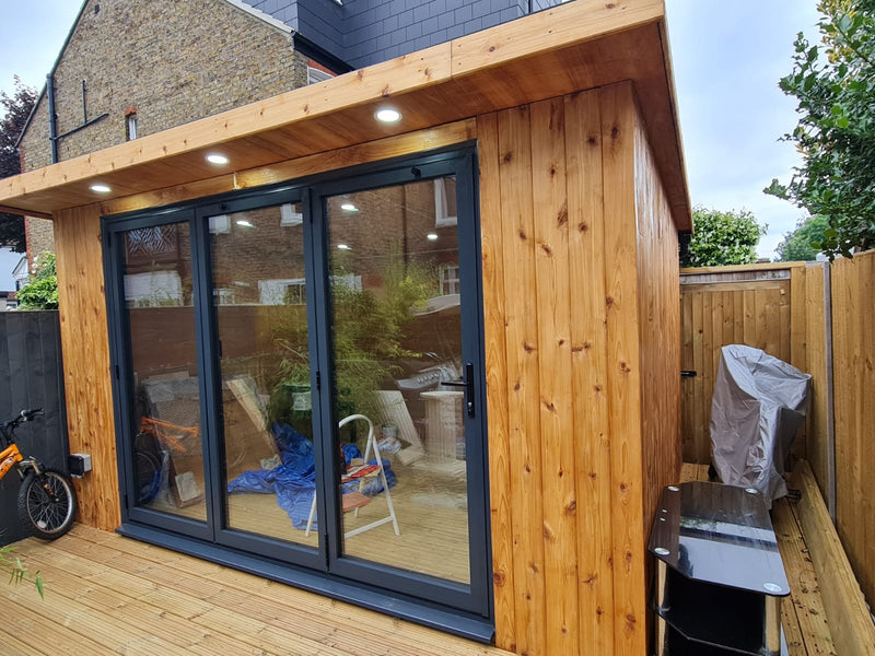 Garden Building Clad With Cedar Tongue and Groove
