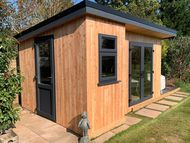 Garden Building With Home Grown Larch Cladding