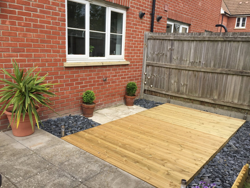 Pressure Treated Standard Decking Kit in garden