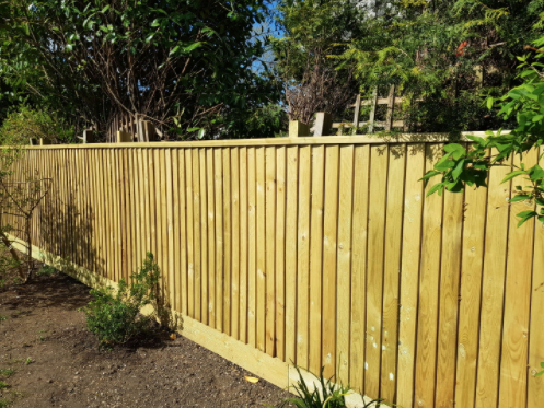 Example Of a timber Fence Capping Rails In Use