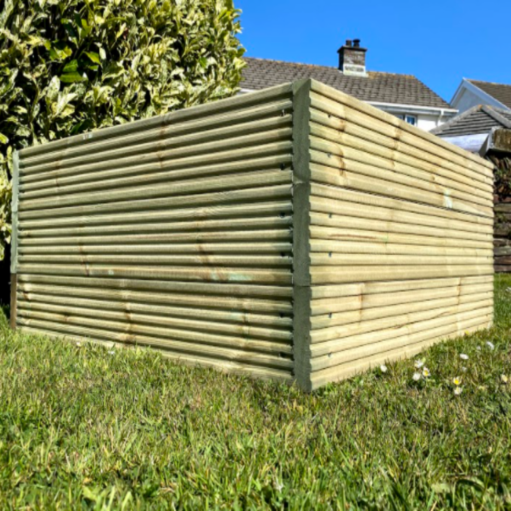 handmade raised decking planter in a garden