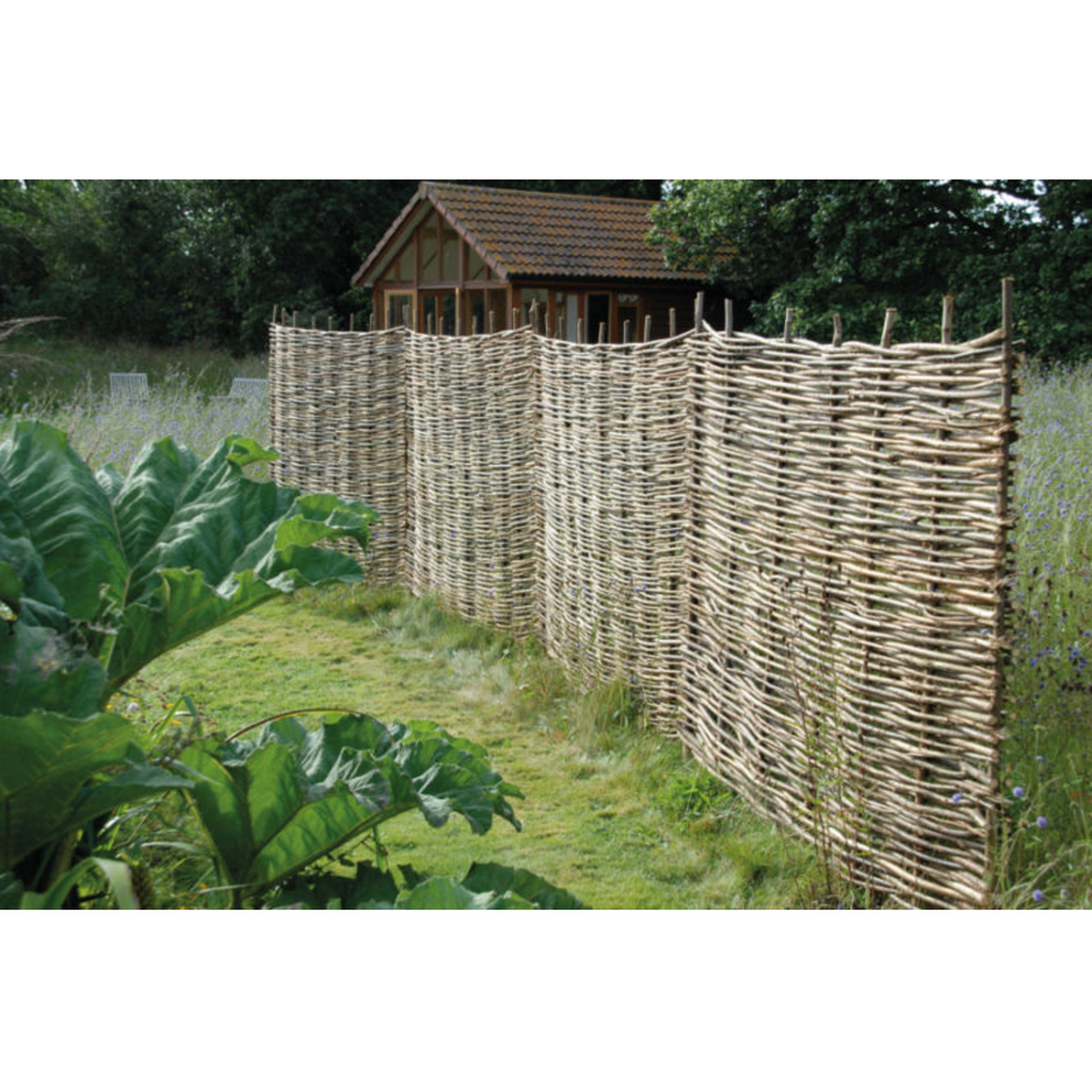 Rustic wooden Hazel Hurdles Being Used As Garden Screens