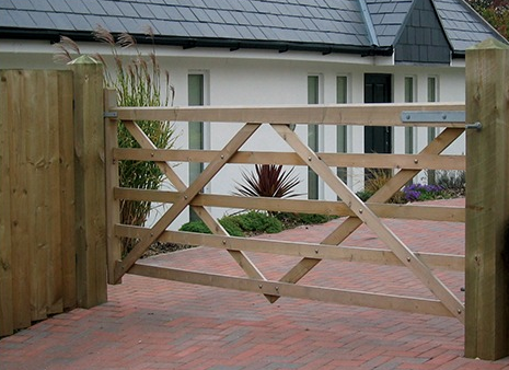 Planed 5 Bar Gate Hanging From Wooden Gate Post
