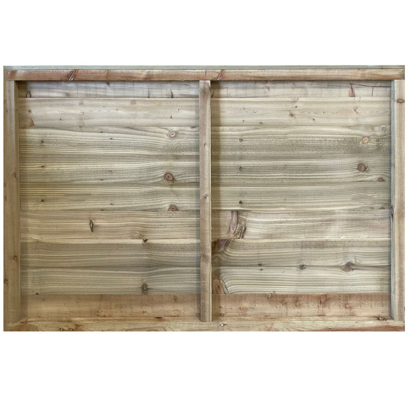 behind of a timber closeboard fence panel
