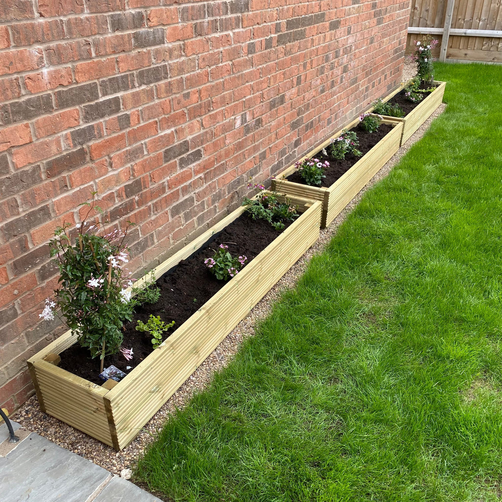 Treated Decking Garden Planter with plants in